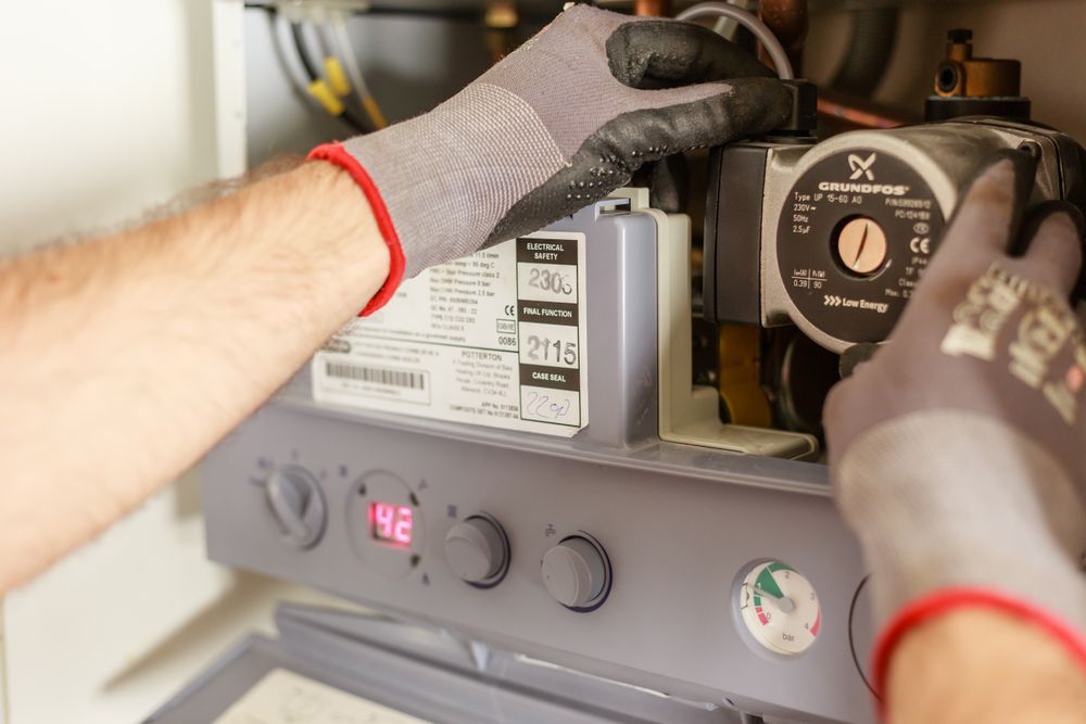 Plumber fitting and testing a valve